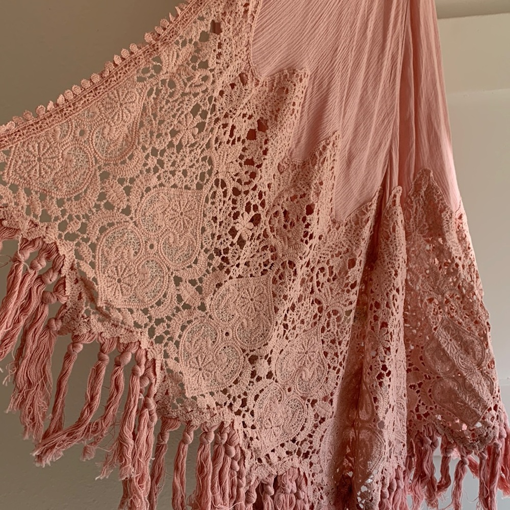 Lacey pink works well over maxi or with jeans. Non smoking. Knee length.